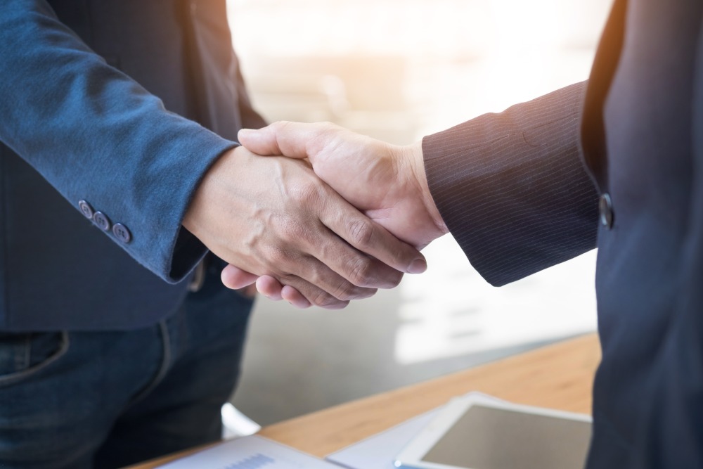 Two Man Shake Hands Close Up